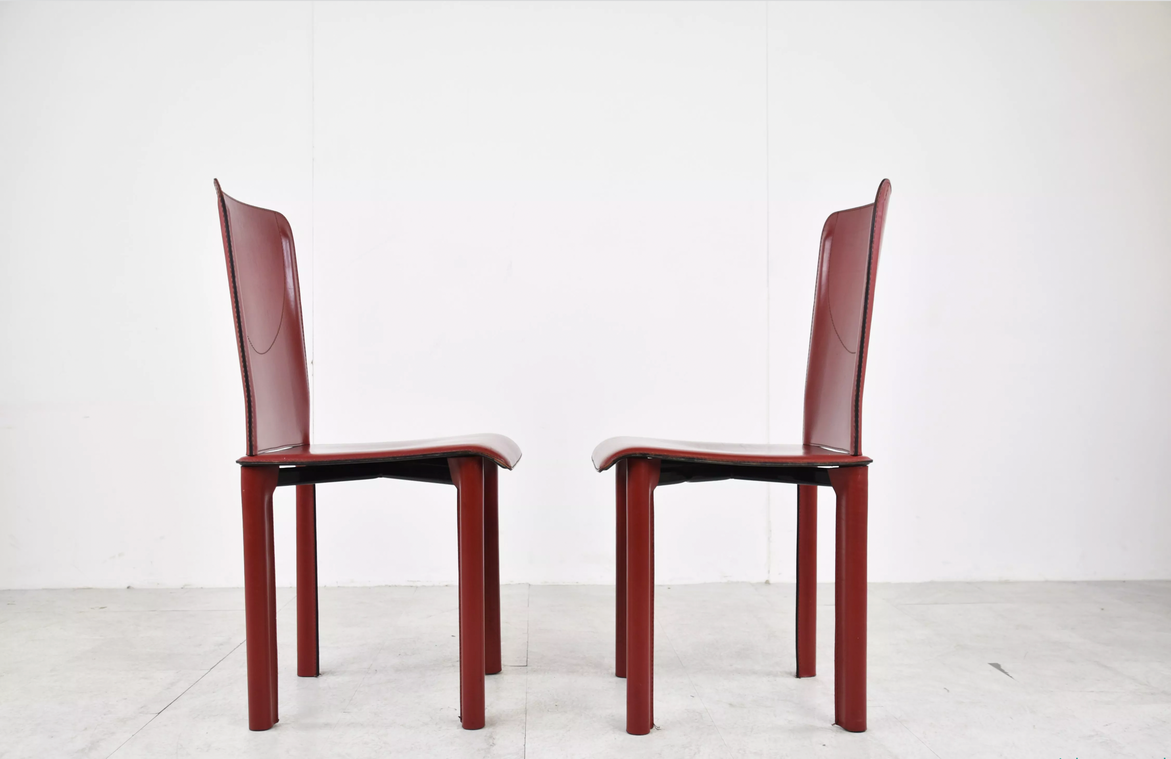 6 red leather dining chairs made in Italy, 1980s