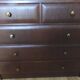 Antique chest of drawers from the 50s with 5 curved drawers, vintage old-style assembly and brass knobs