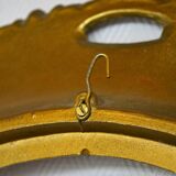 Oval frame in golden resin