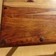 Solid wood and wrought iron table
