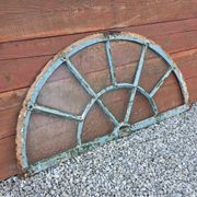 Old wrought iron full riveted gates from the 19th century.