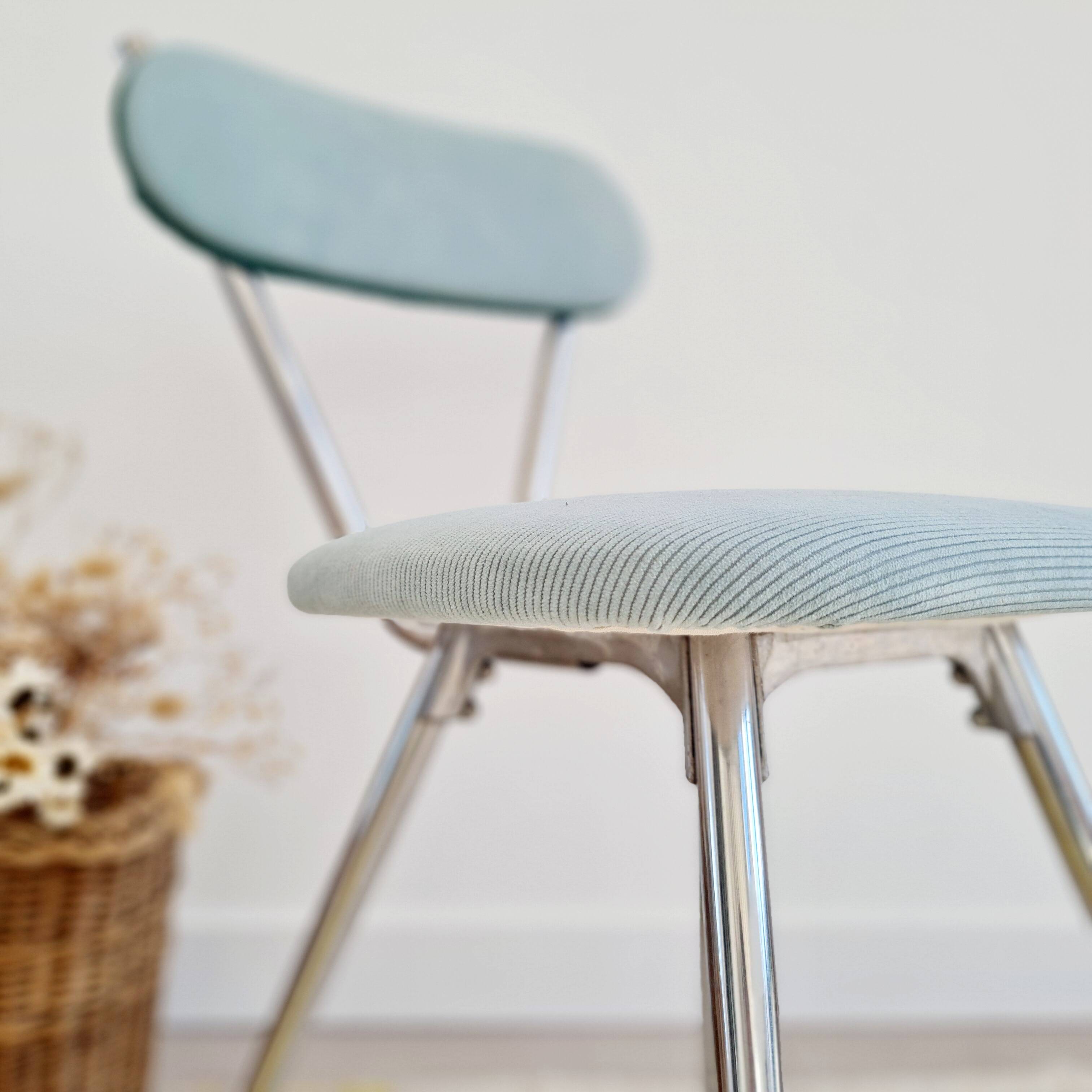 Old chrome metal and blue velvet chair