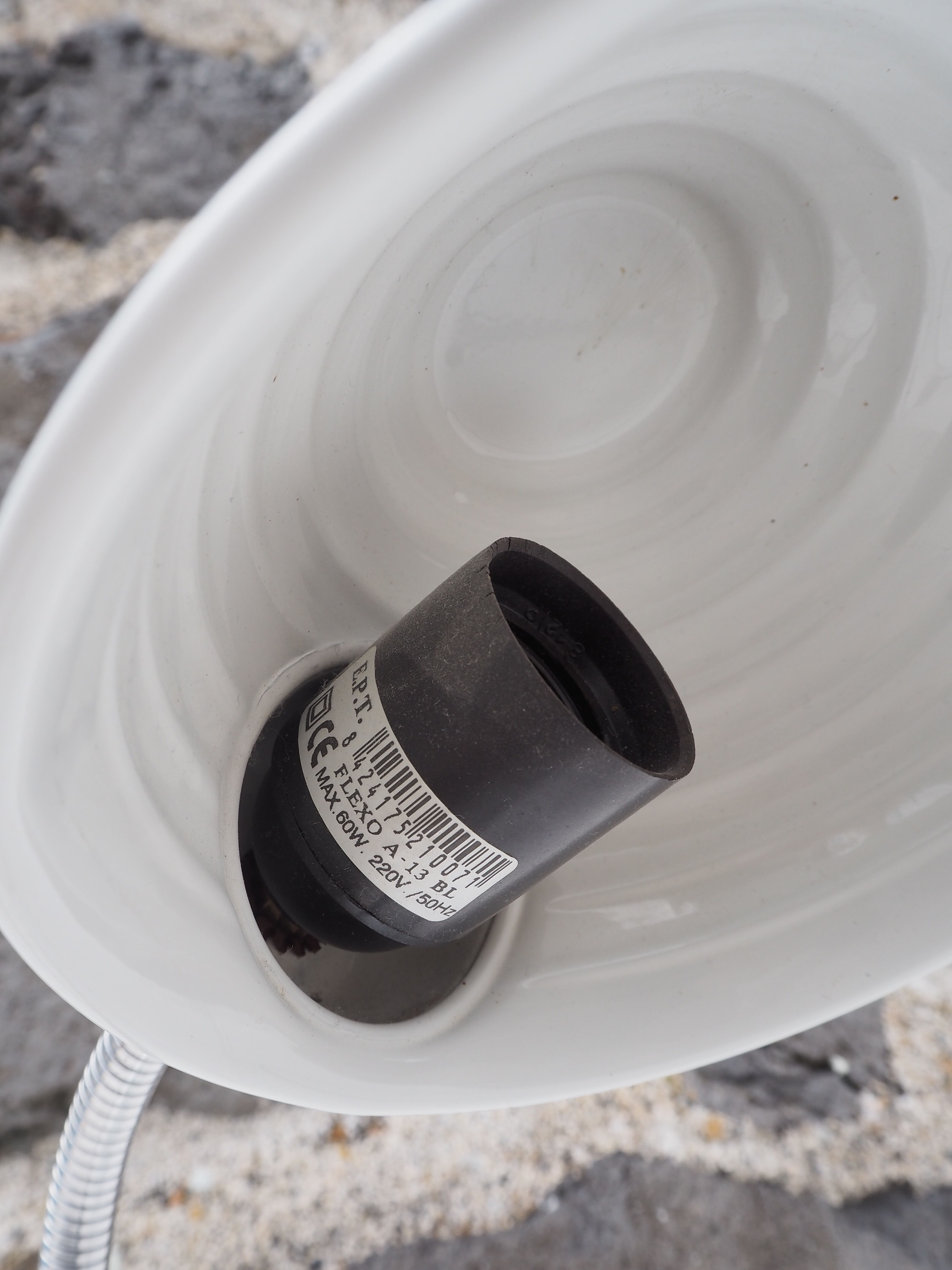 White articulated lamp with metal arm