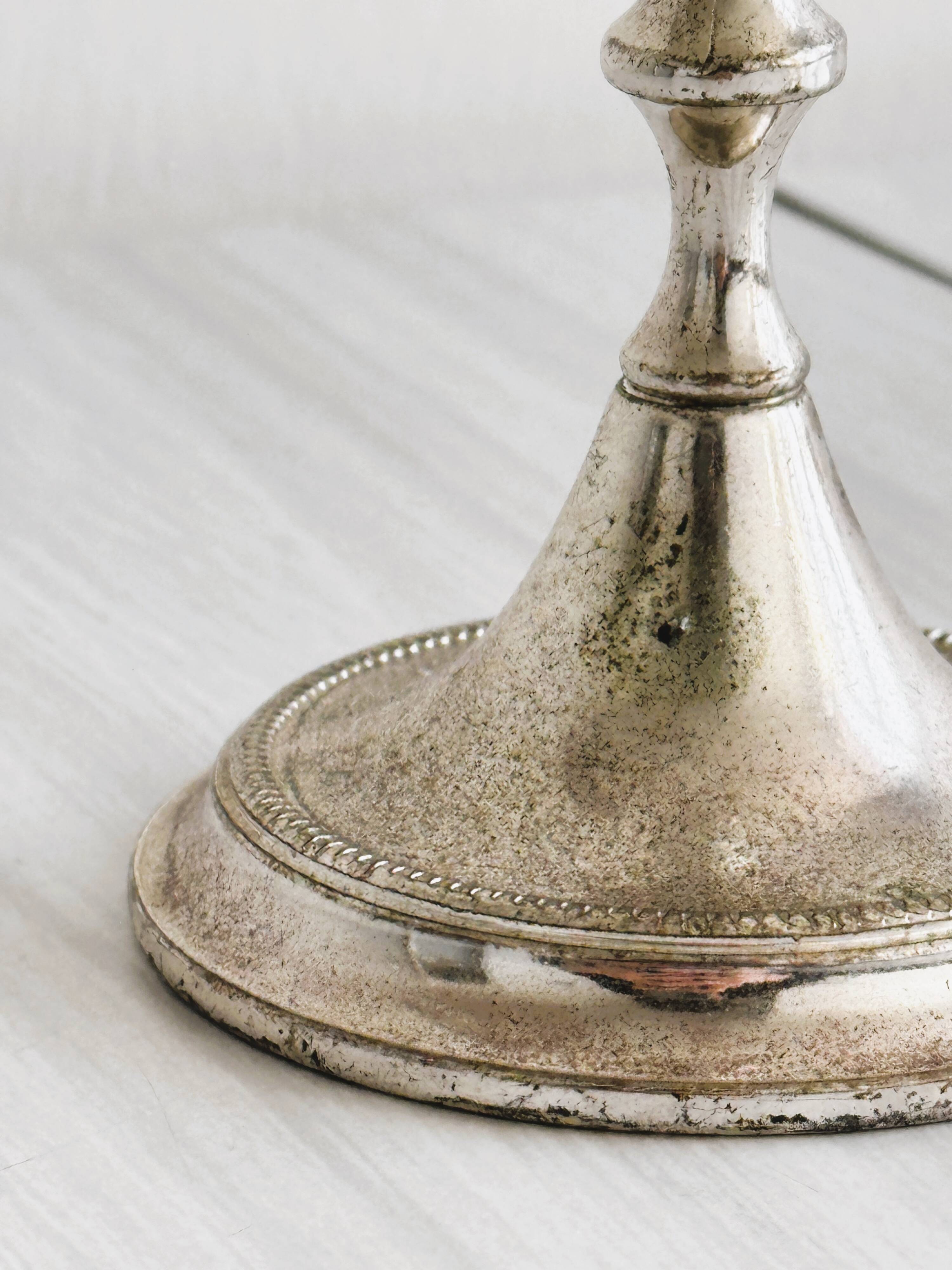 Small patinated candle holder.