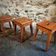 Set of 3 vintage French wooden stools from the 1950s.