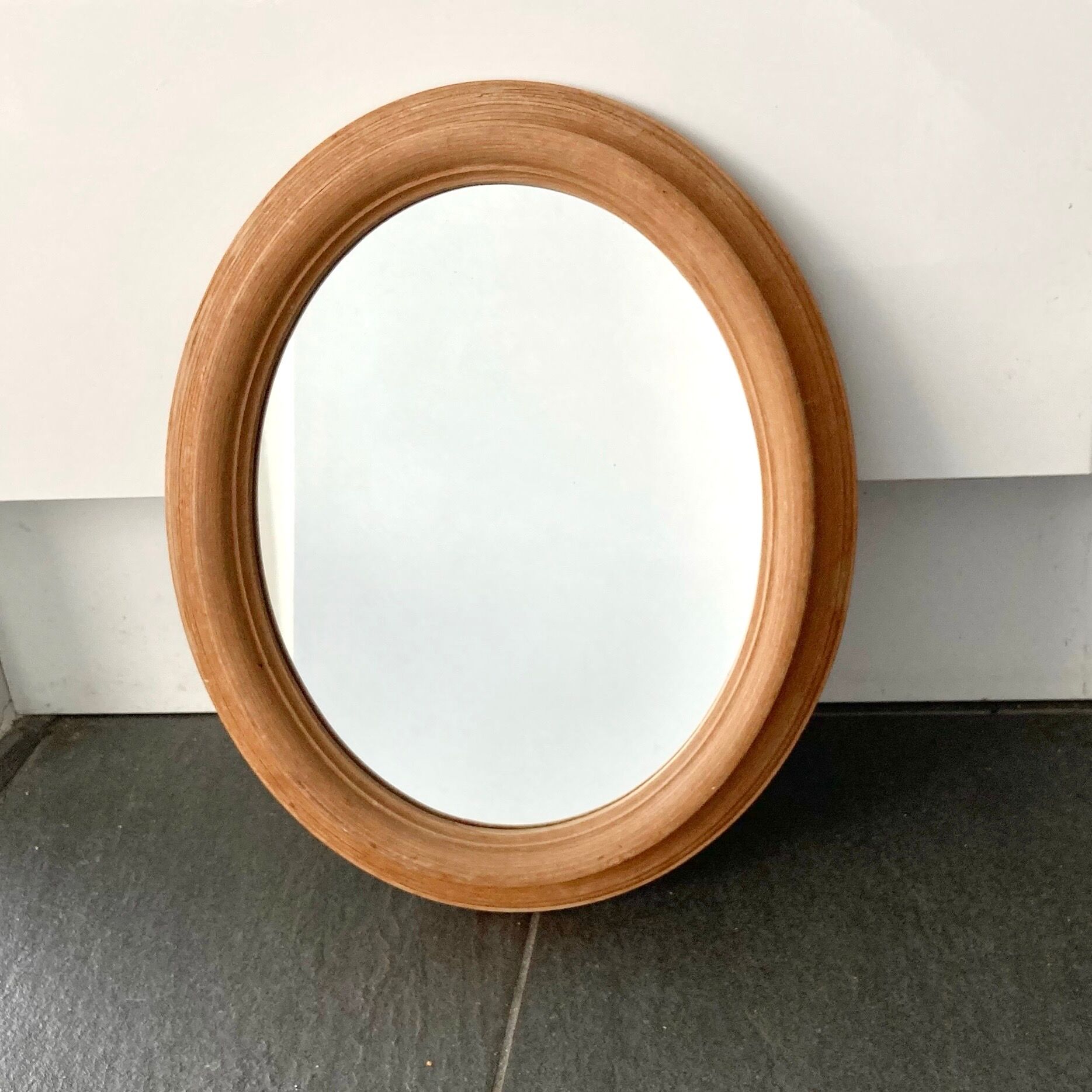 Oval wooden mirror 31x37cm