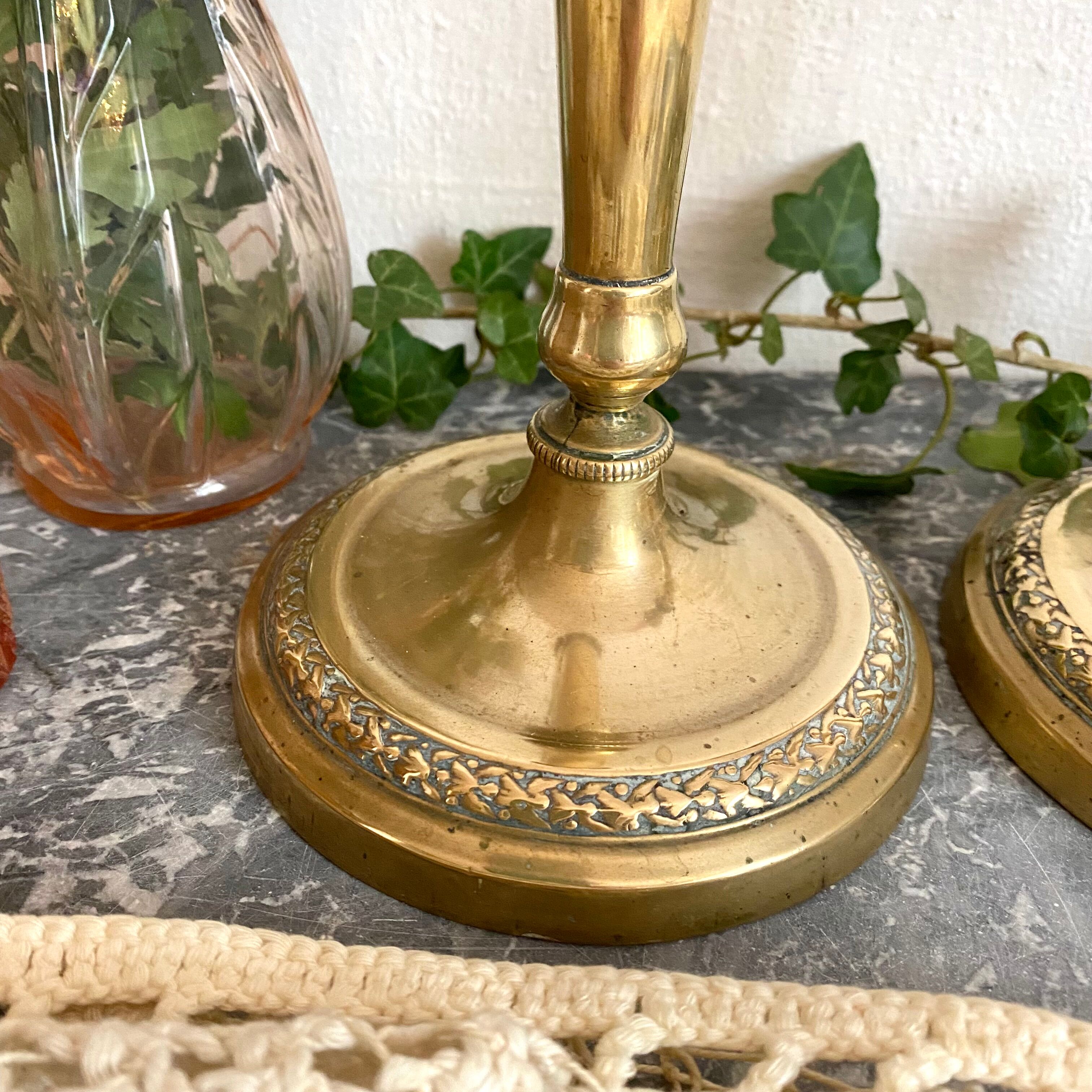 Pair of old gilded brass candlesticks