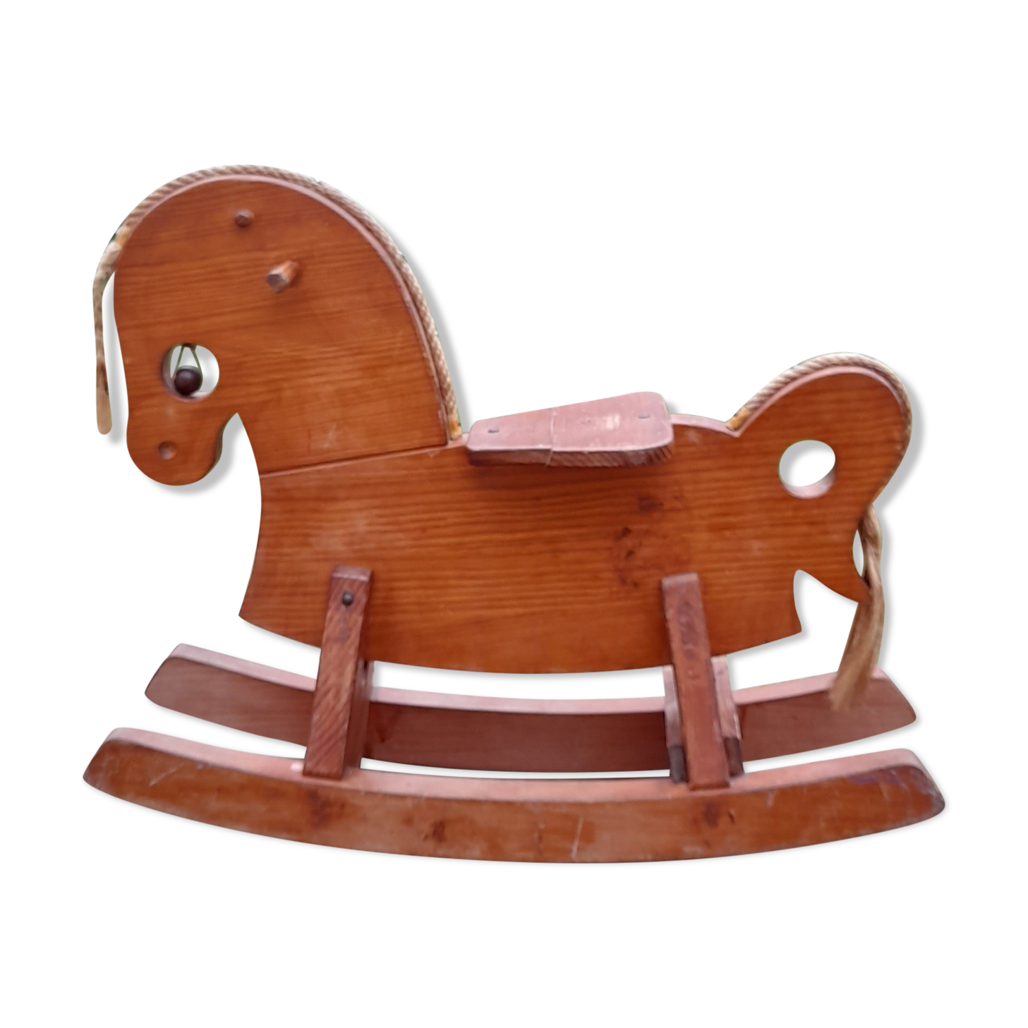 Rocking horse in raw and glazed wood