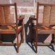 Pair of oak armchairs with straw seats and backs.