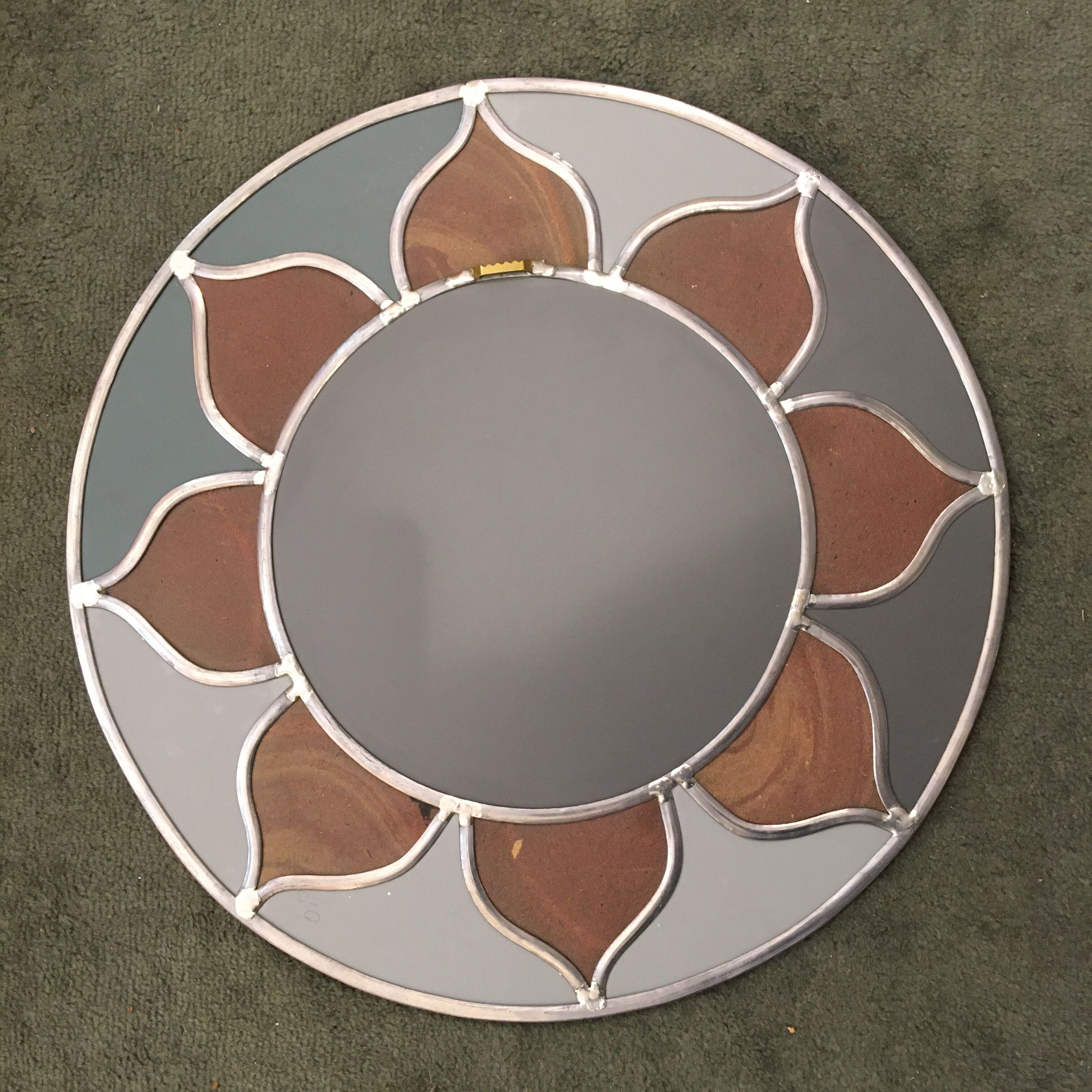 Mirror sun stained glass and ceramic inclusions