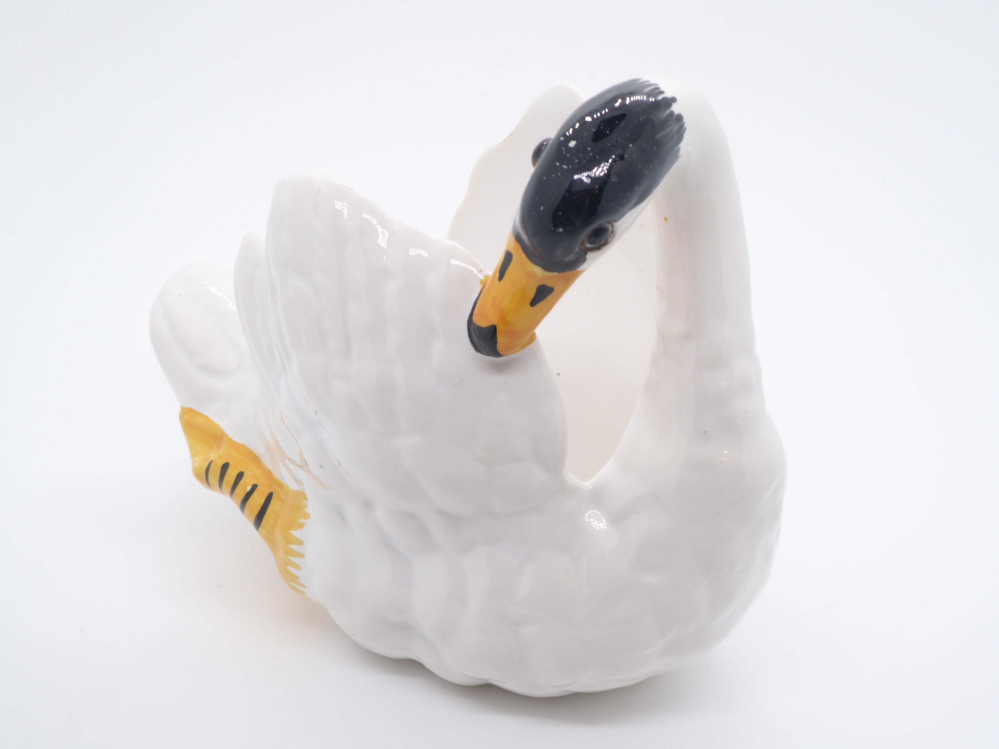 Ceramic pot cover in the shape of a swan