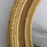 Mirror antique medallion gilded with gold leaf