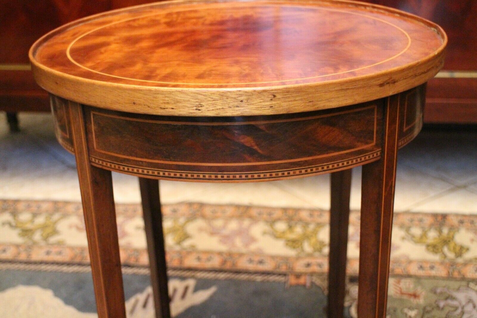 Healed mahogany sofa with Louis XVI-style décor