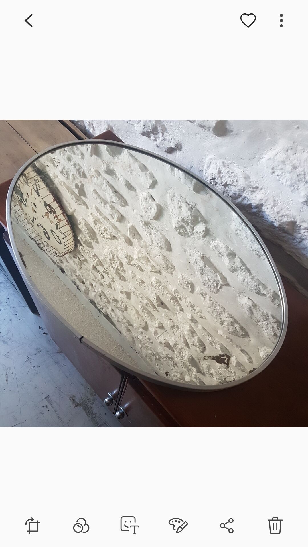 Old aluminum oval mirror