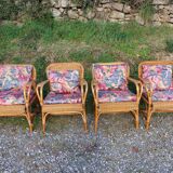 4 armchairs and a coffee table made of rattan and bamboo wood, vintage.