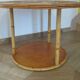 Round coffee table in bamboo, rattan, and wood with an 80s star pattern.