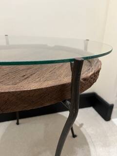 decorative wrought iron round table, glass and wood top.