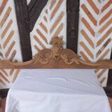 Old sandblasted wooden pediment