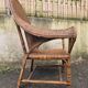 Arts & Crafts armchair in wicker and rattan attributed to Dryad & Co, UK, circa 1920.