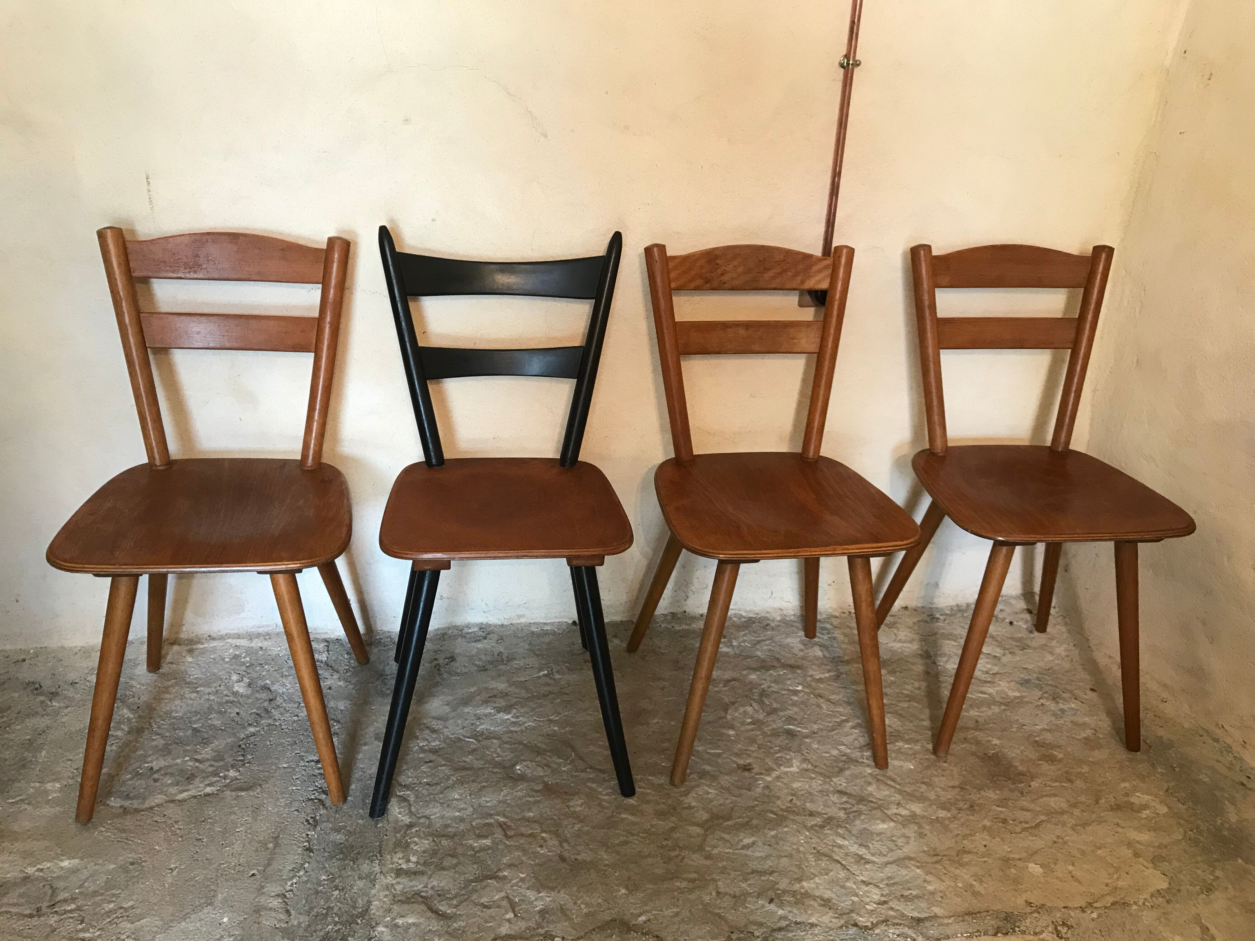 Set of 4 mismatched vintage chairs compass legs