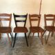 Set of 4 mismatched vintage chairs compass legs