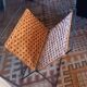 Folding magazine rack in metal and vintage woven wicker