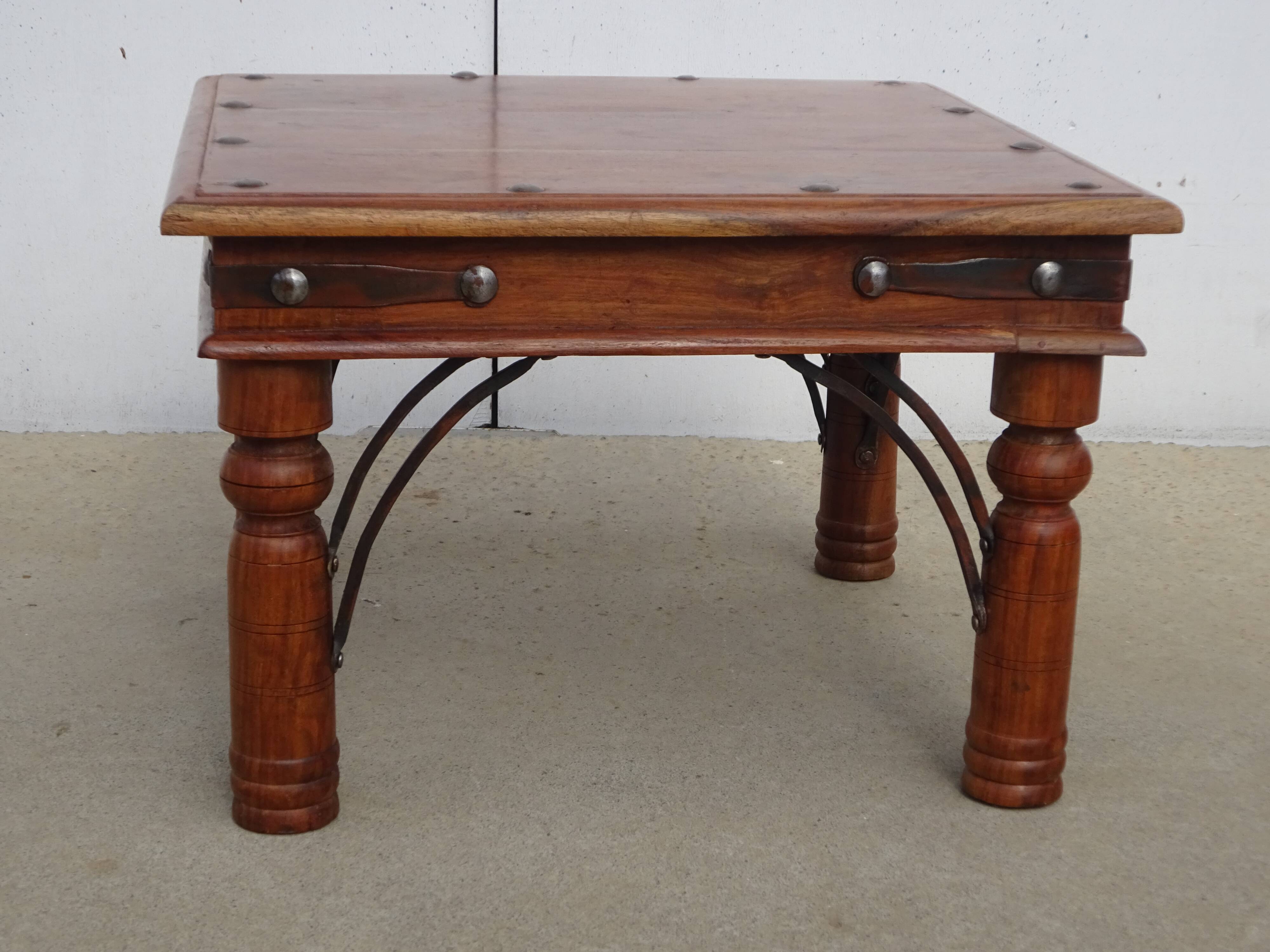 Square coffee table in exotic wood and wrought iron.