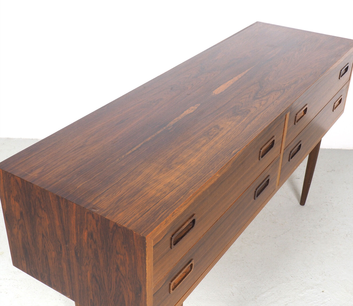 Hundevad Rosewood chest of drawers on high legs, 1960's