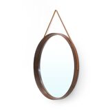 Round mirror with leather strap, 1960s
