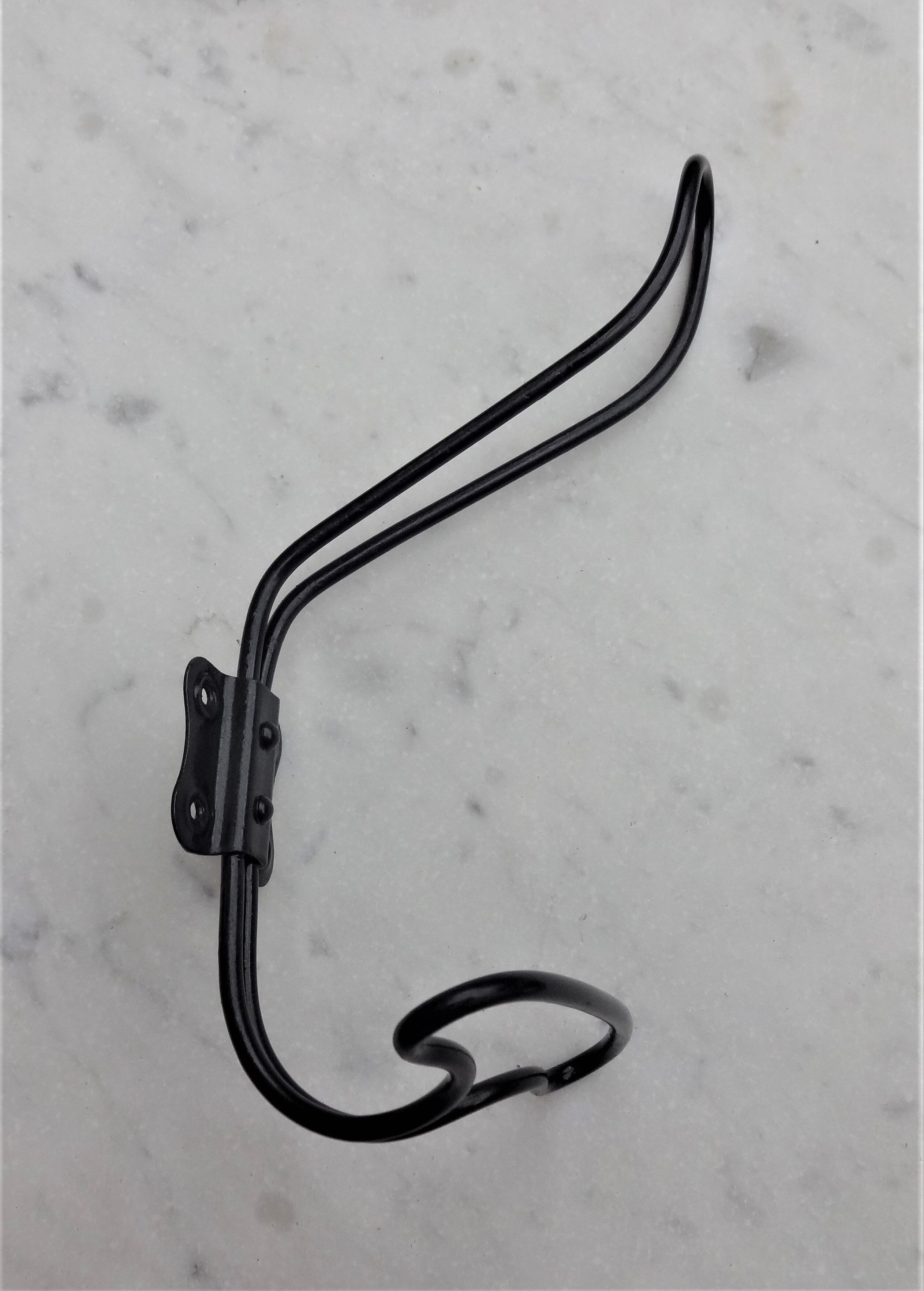 Vintage coat in black lacquered iron wire