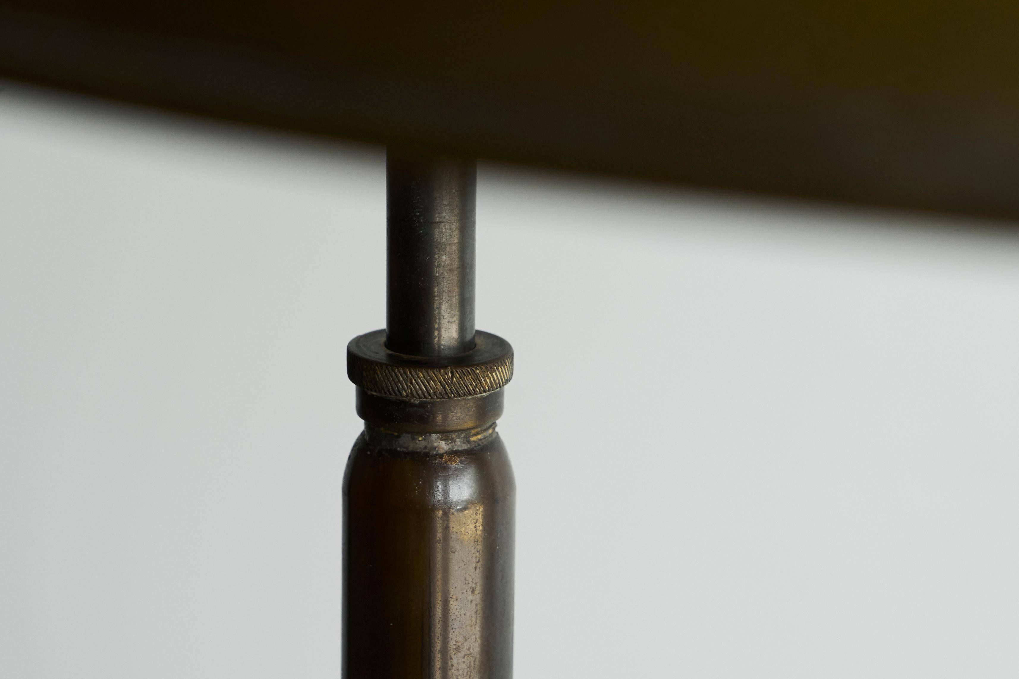 Bauhaus style table lamp in patinated brass from the 1930s.