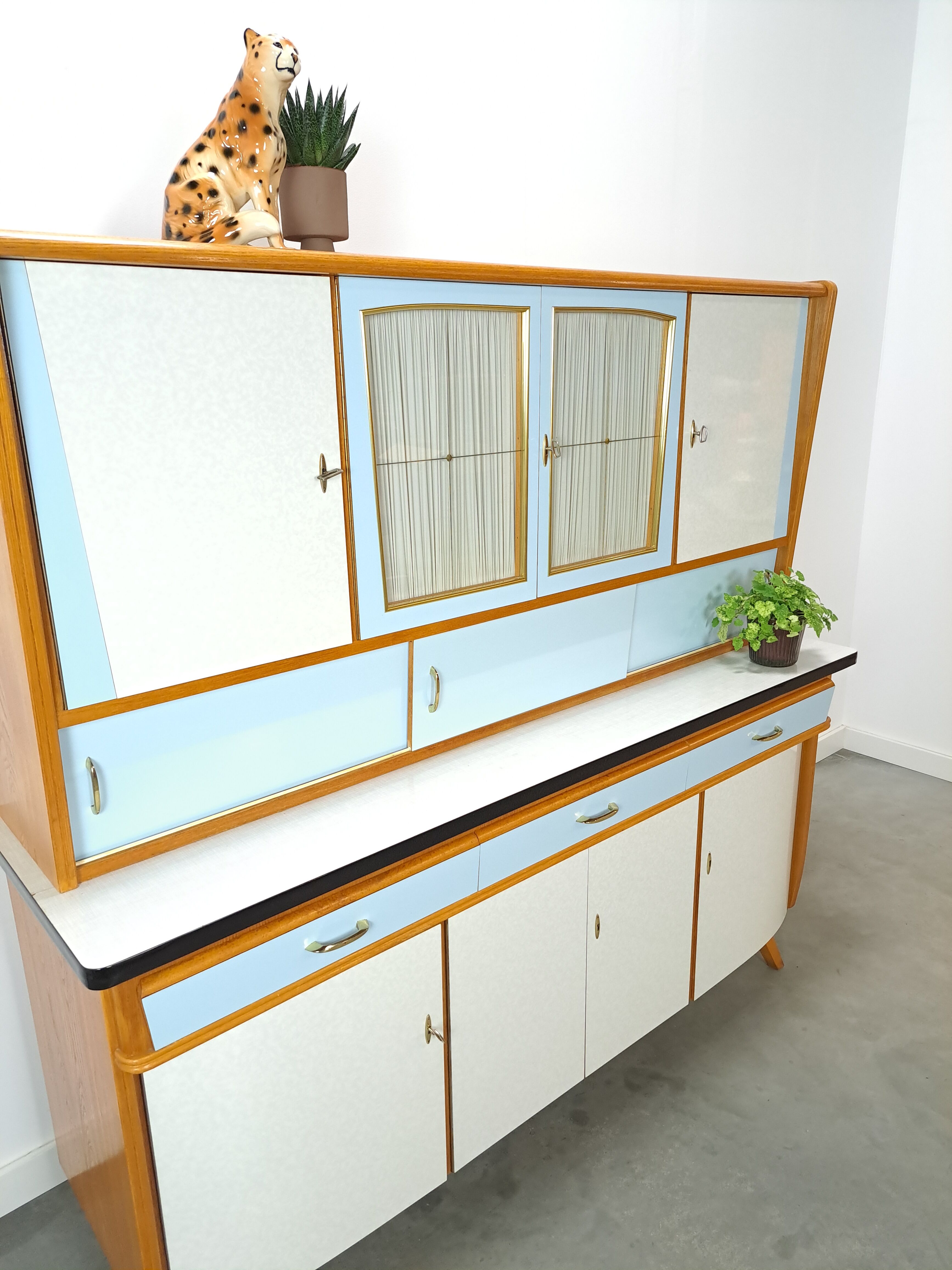 50s vintage kitchen cabinet with brass and formica