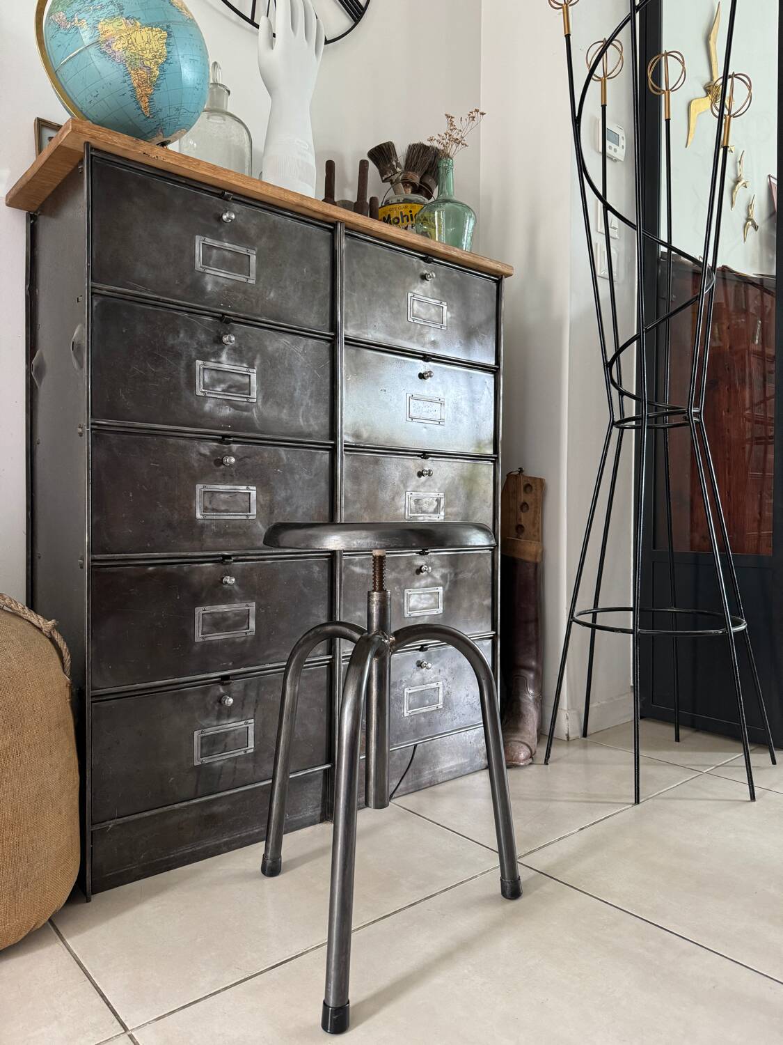 Height-adjustable tripod metal stool