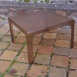 Table basse années 70 en plexis fumé