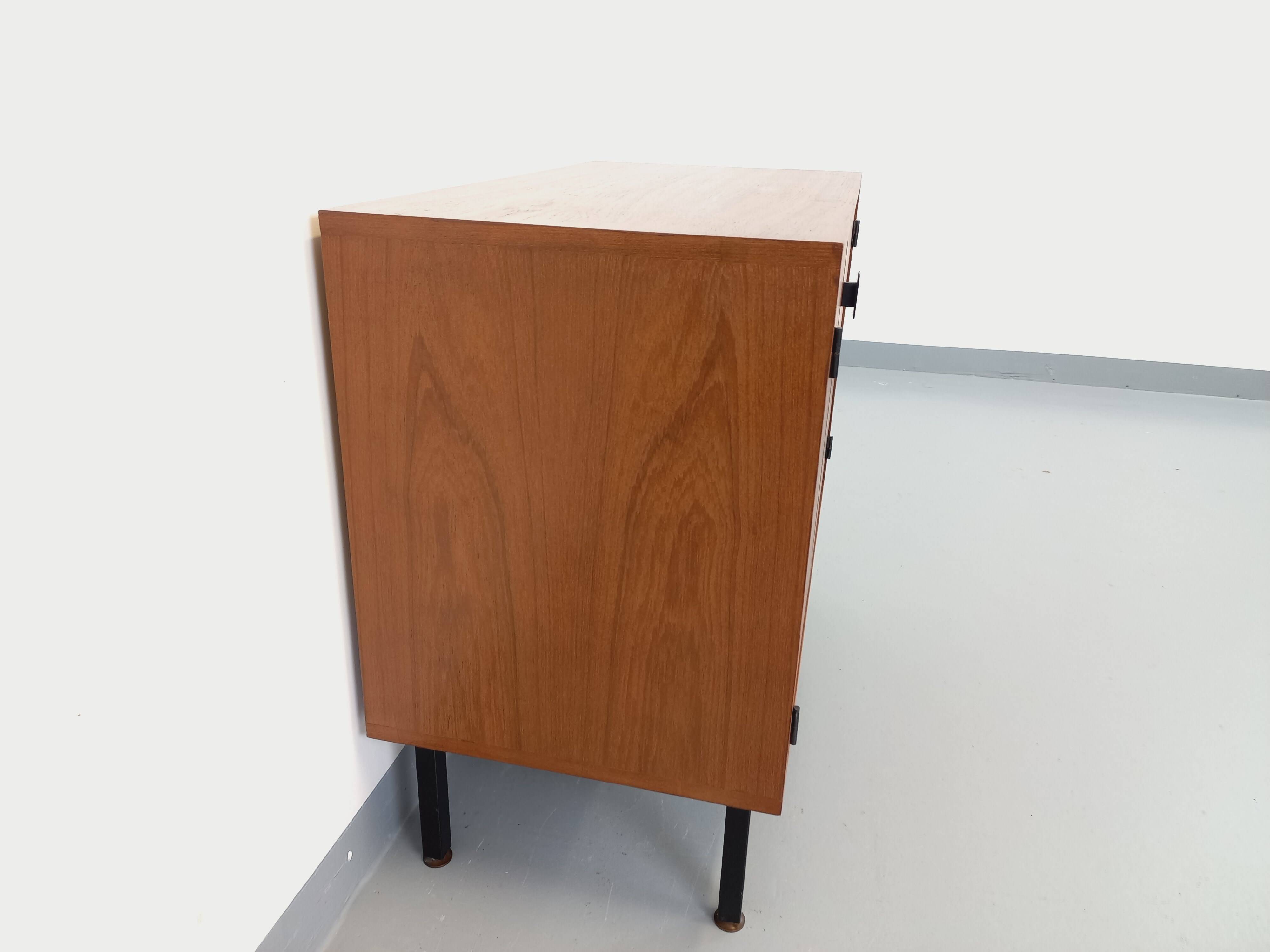 Small vintage storage unit in modernist Scandinavian style in teak from the 60s