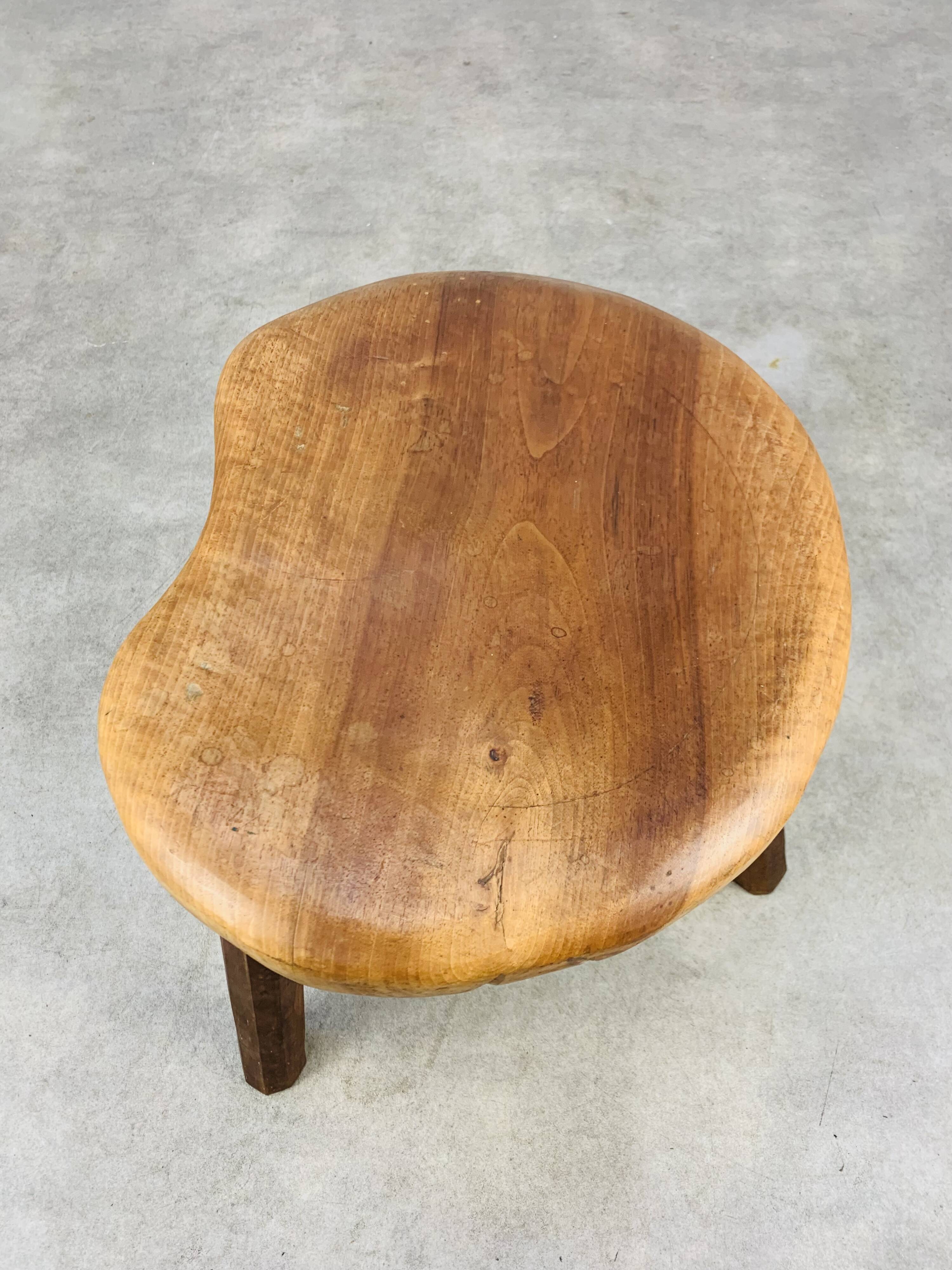 Brutalist tripod stool in solid wood