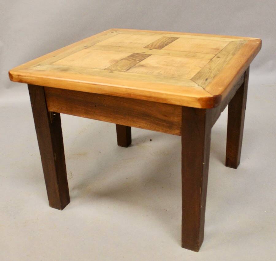 Coffee table on old parquet floor