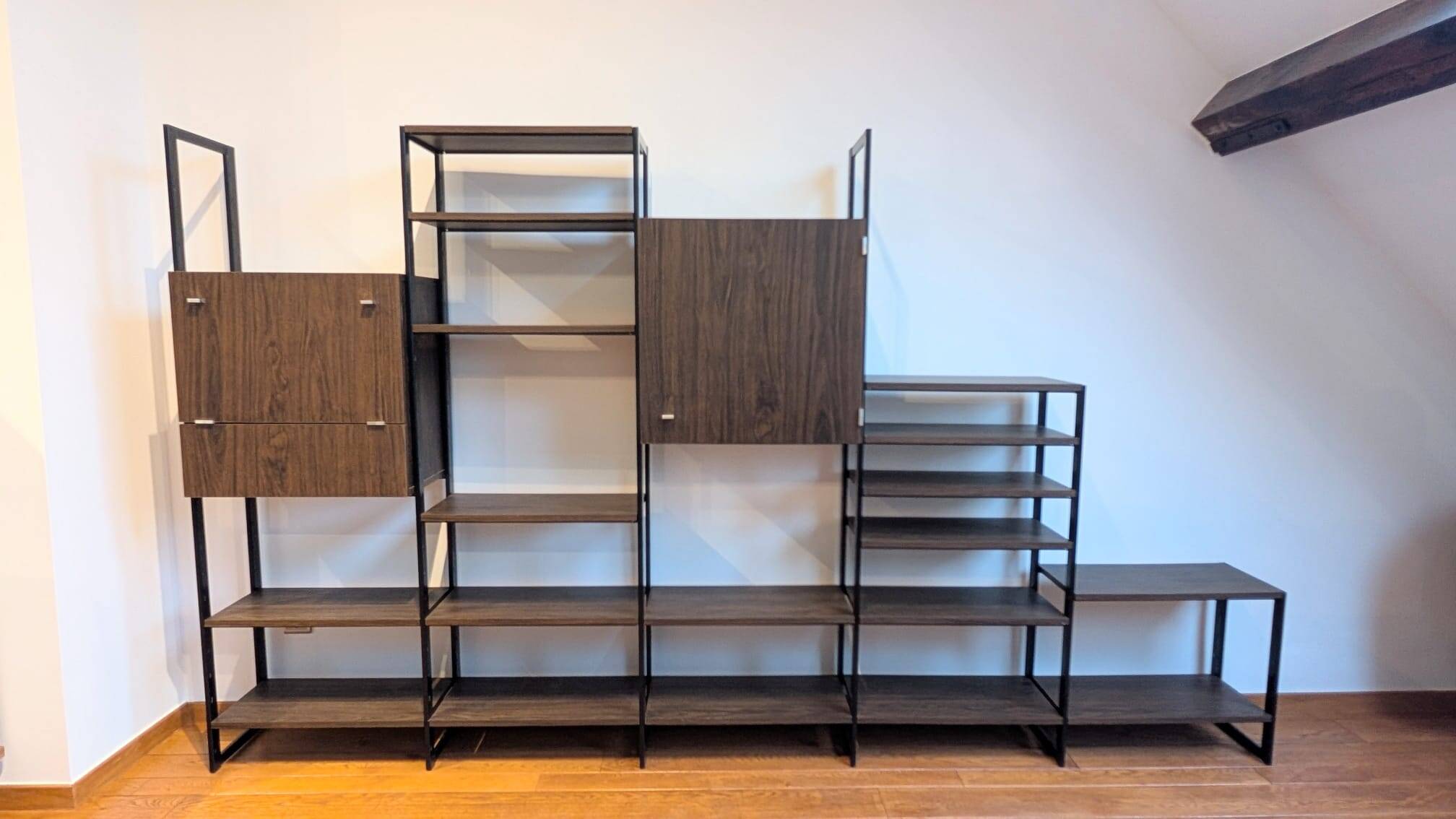 Modular rosewood bookcase by Pierre Guariche for Meurop