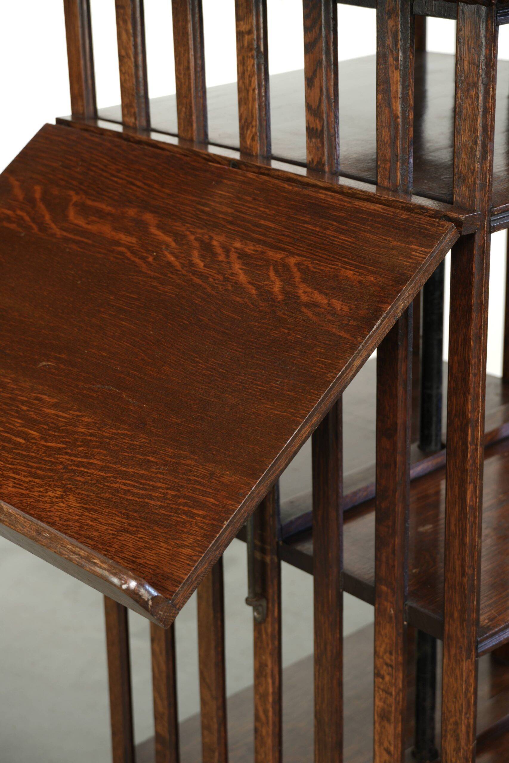 Large antique English oak book carousel from the 19th century