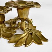 Art Nouveau style three-flower brass candle holder