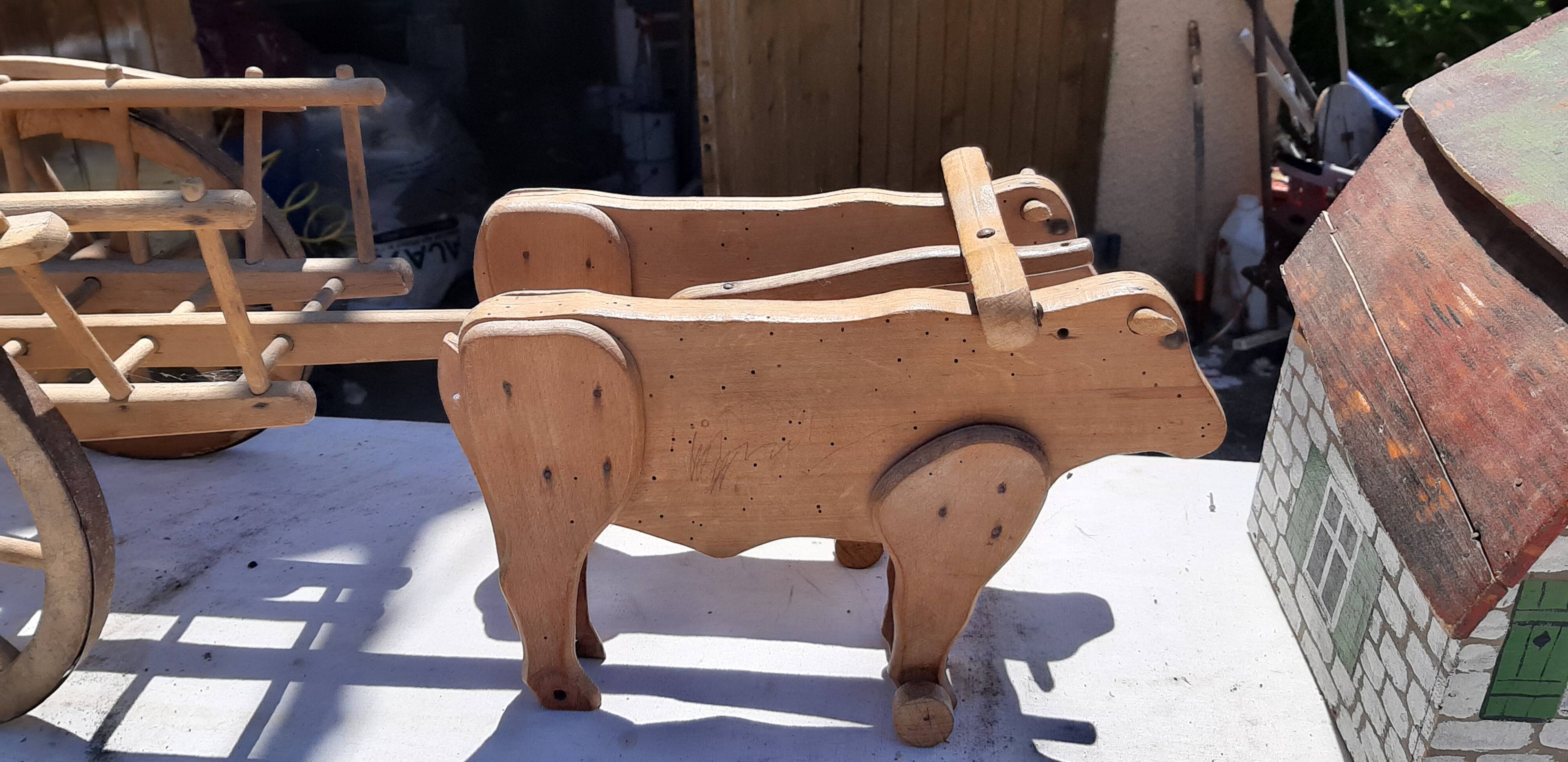 Set of old wooden toys from the farm