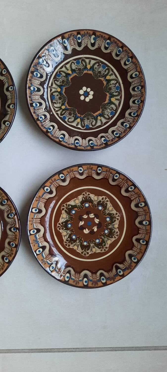 Hand painted pottery plates