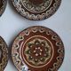 Hand painted pottery plates