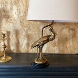Lampe à poser cigogne en laiton