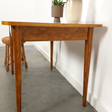 Vintage wooden dining table with formica top