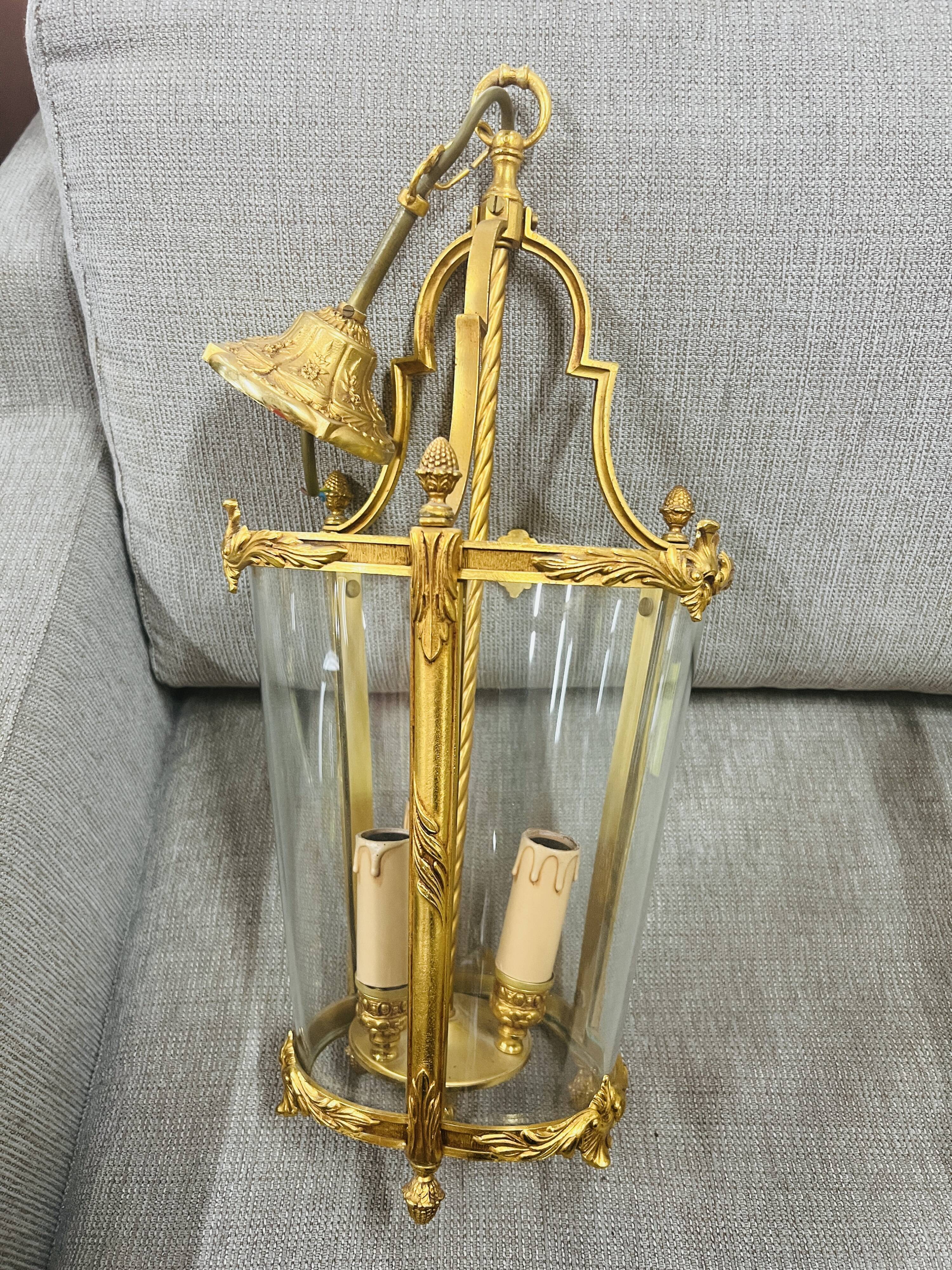 Louis XV style lantern suspension in gilded bronze and glass