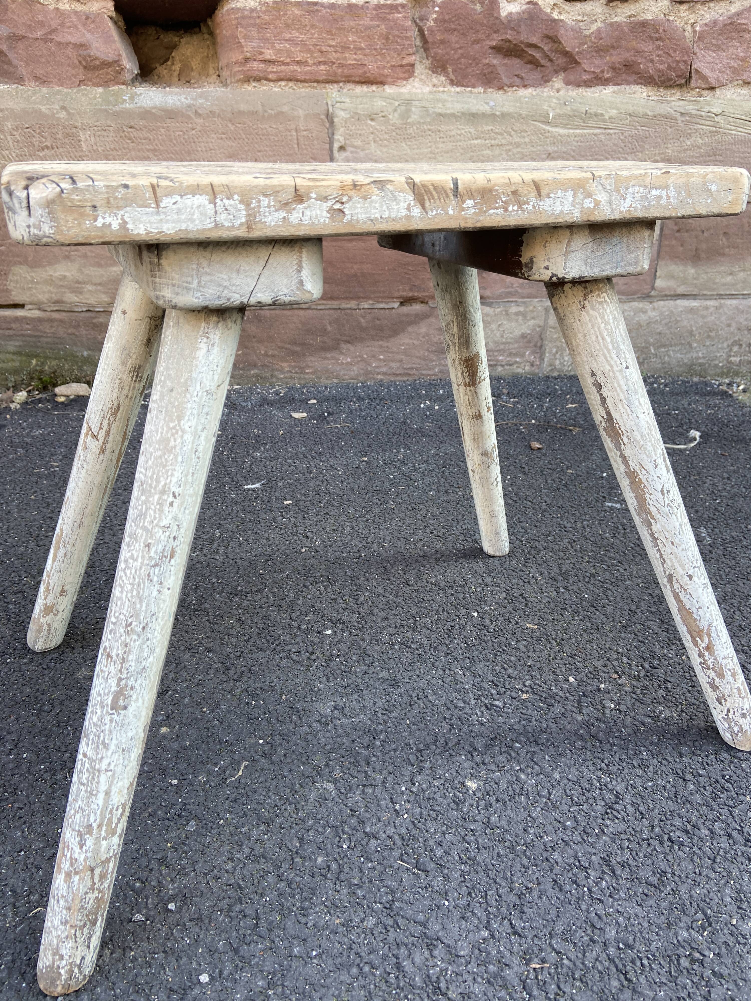 Very old rustic farmhouse stool