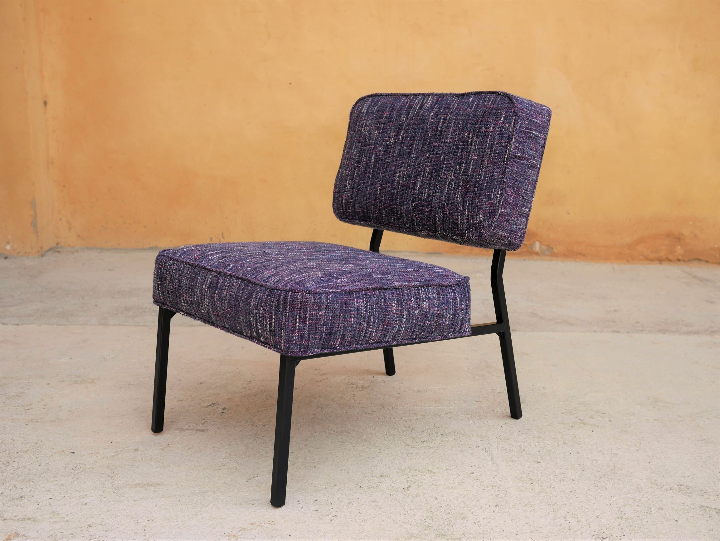 Vintage modernist metal foot armchair