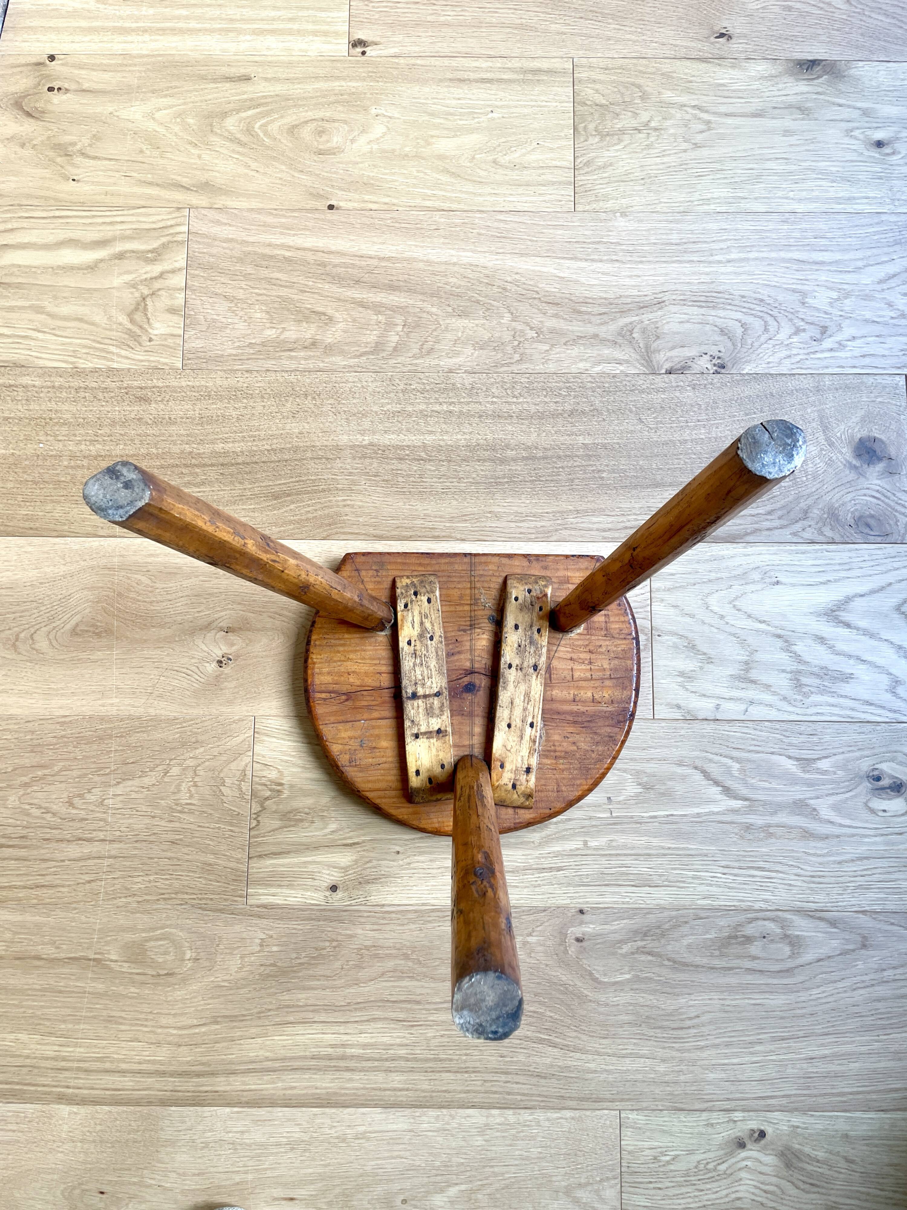 Old wooden farm stool