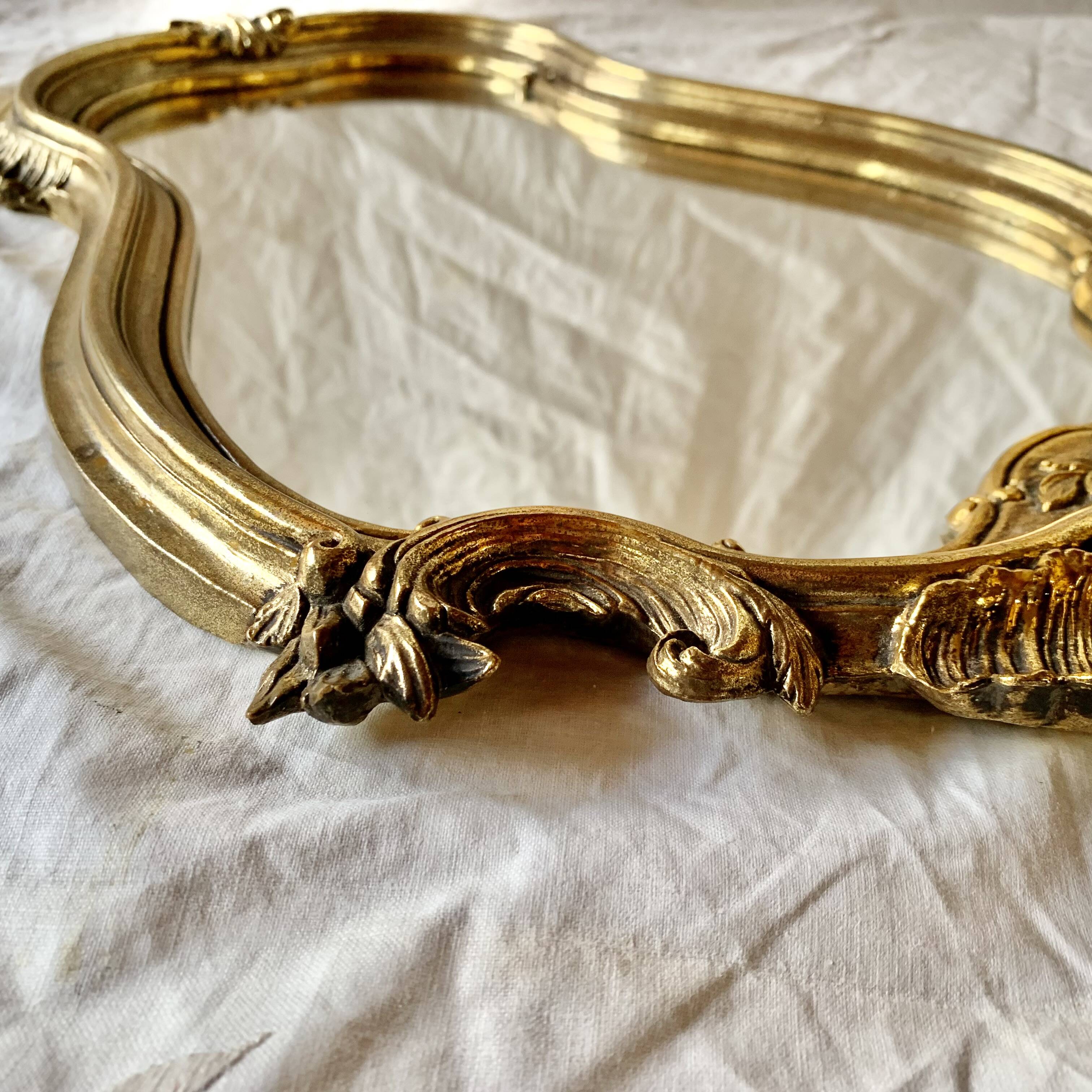 Old wall mirror in golden resin rococo style - made in france